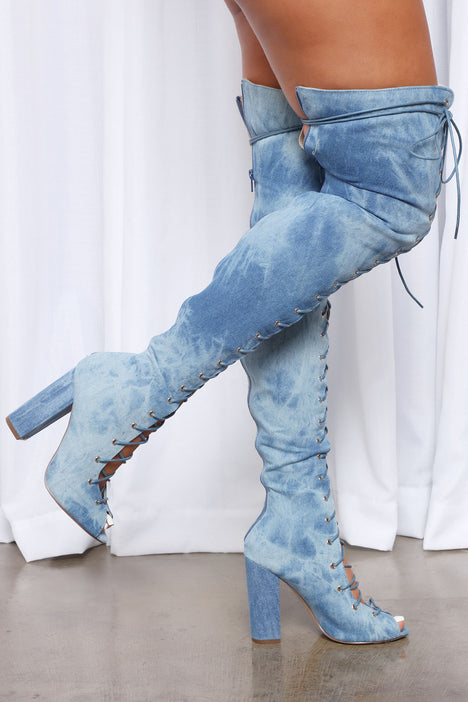 Distressed denim deals thigh high boots