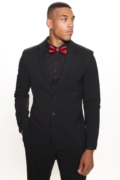 All black tux with red bow tie top