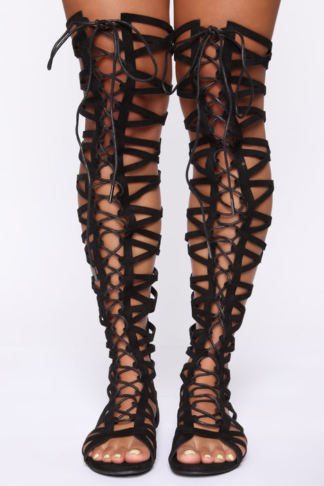 Thigh high gladiator sandals flat deals