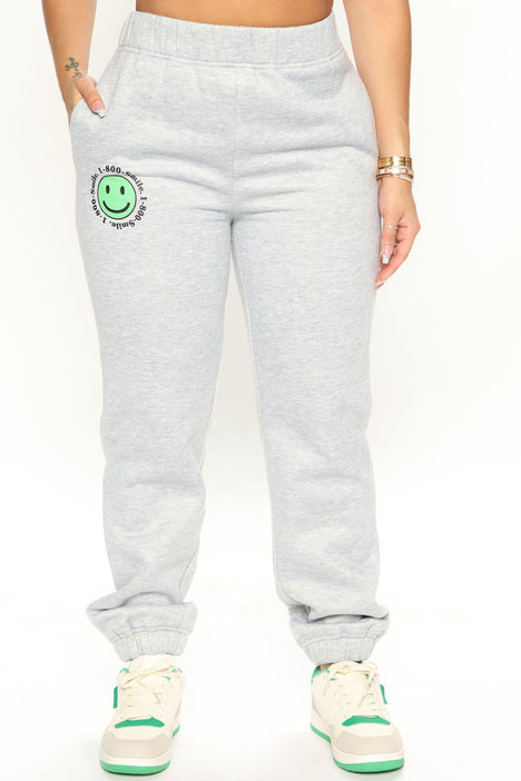 Happy face sweatpants sales