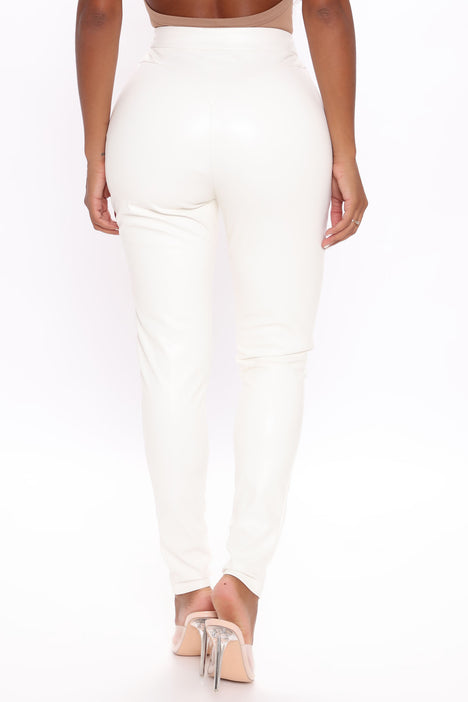 White tight best sale trousers