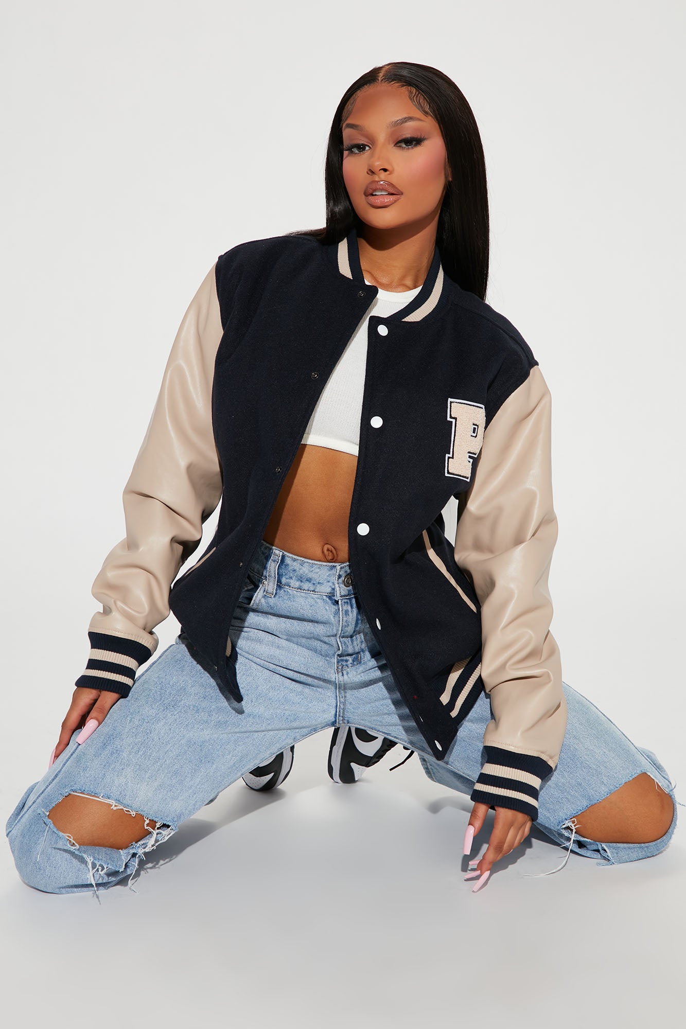 Girl in hotsell varsity jacket