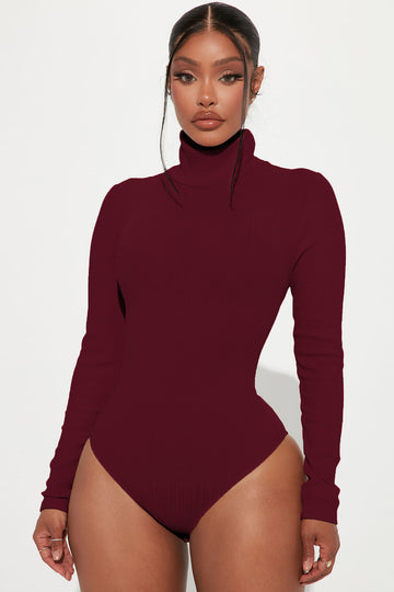 Orange turtleneck bodysuit hotsell