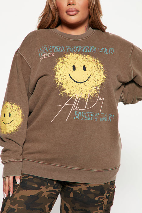 brown smiley face sweatshirt