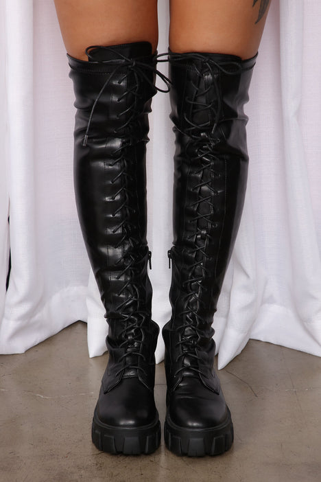 Black thigh high 2024 boots fashion nova