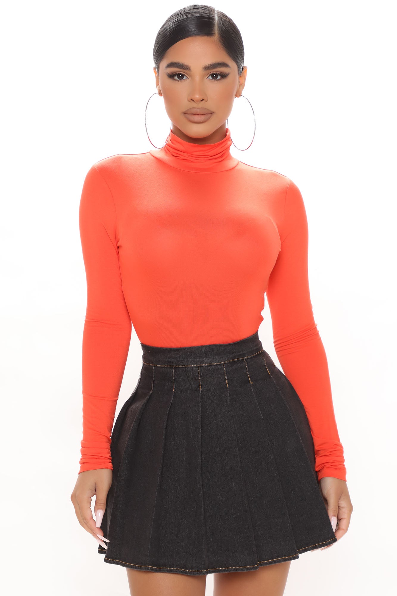 Orange turtleneck bodysuit top