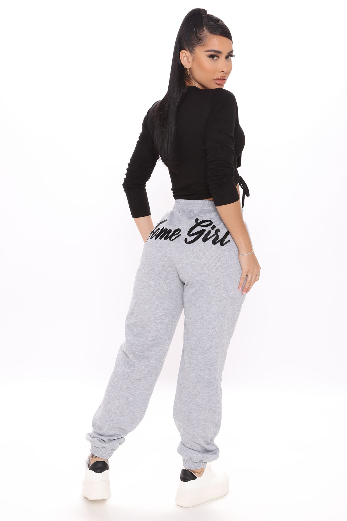Girl with grey sweatpants top