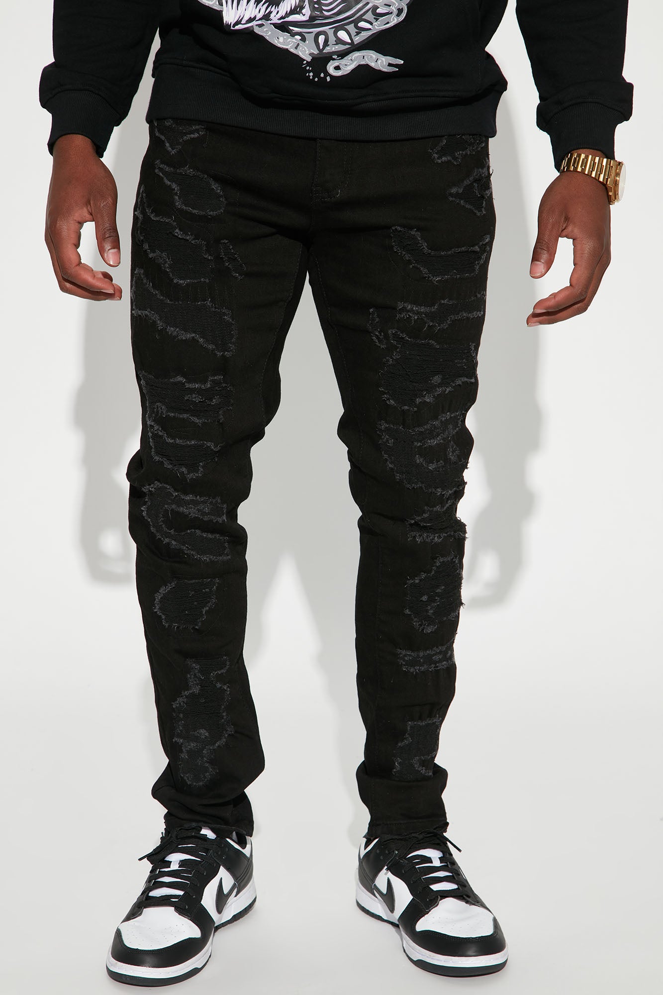 Black ripped stacked skinny jeans 2025