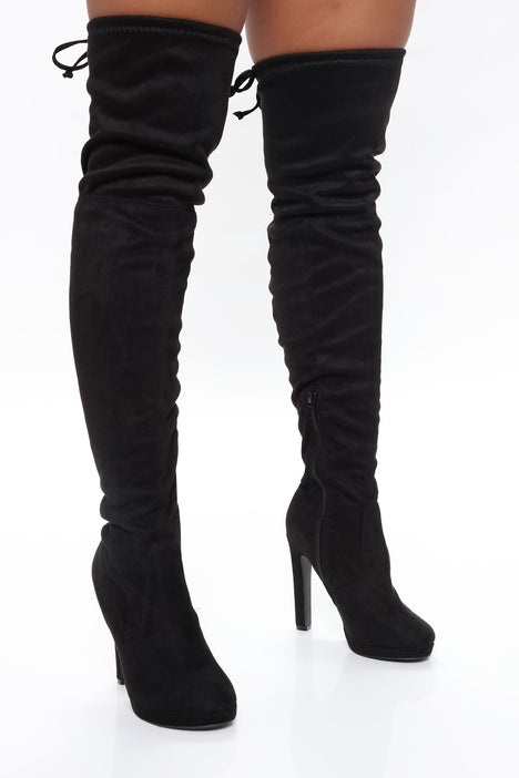 Black knee high shop boots fashion nova