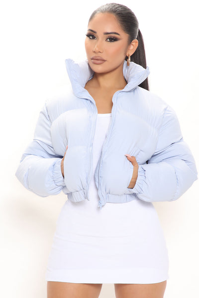 Cropped blue puffer jacket sales