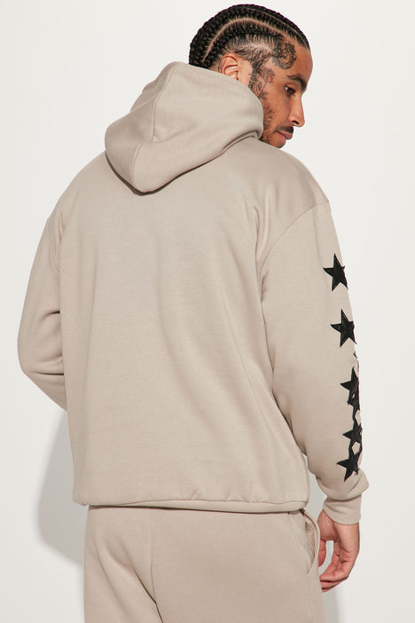 Nike repeat pack taping hoodie in dusty khaki store