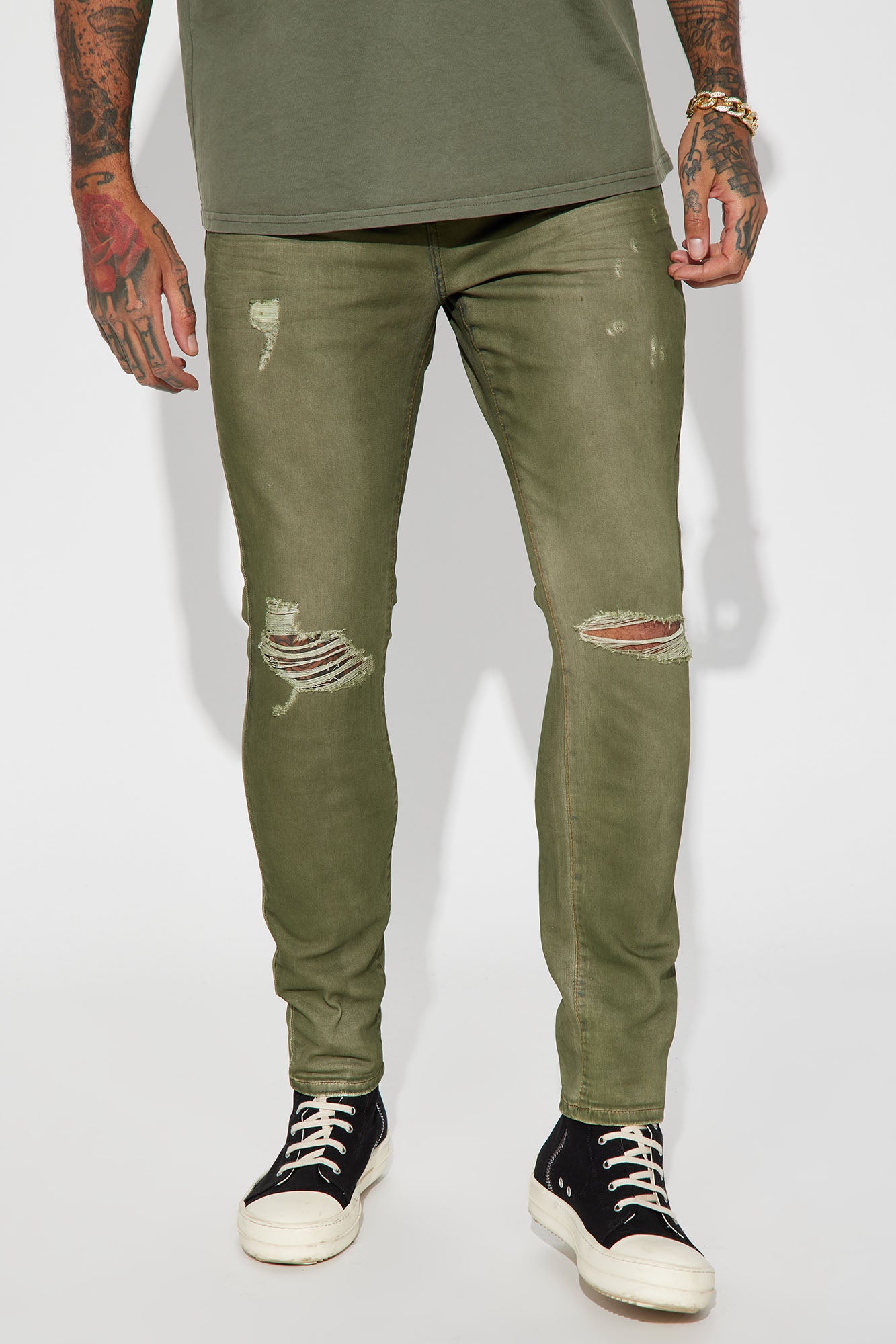 Olive green ripped skinny on sale jeans