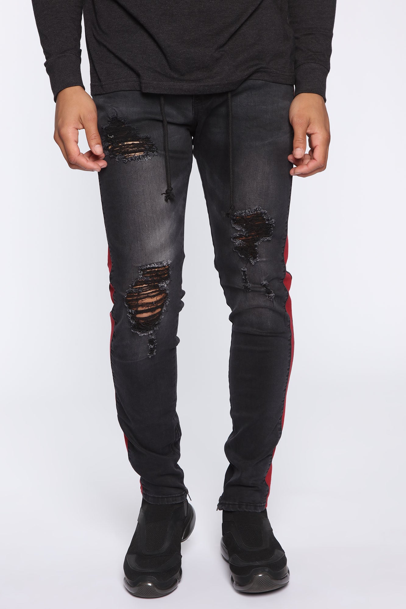 Black ripped jeans with red stripe outlet