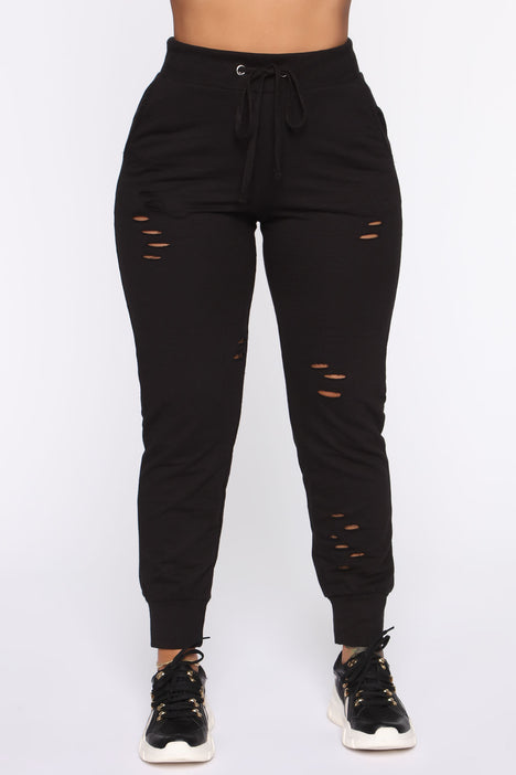 Black ripped joggers womens store