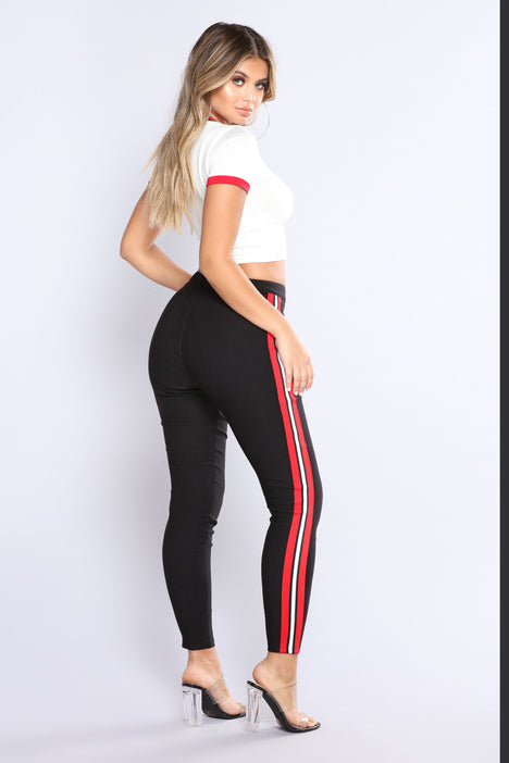Black trousers with red sale and white side stripe