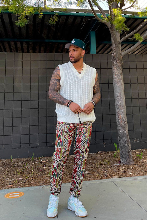 Mens sweater vest best sale outfits